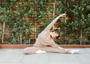 Megan Roup stretching