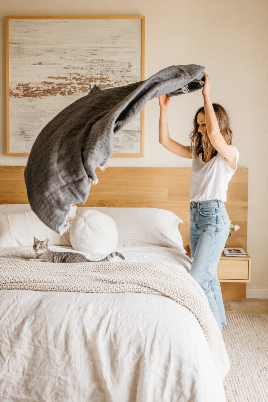 Camille bedroom, making the bed