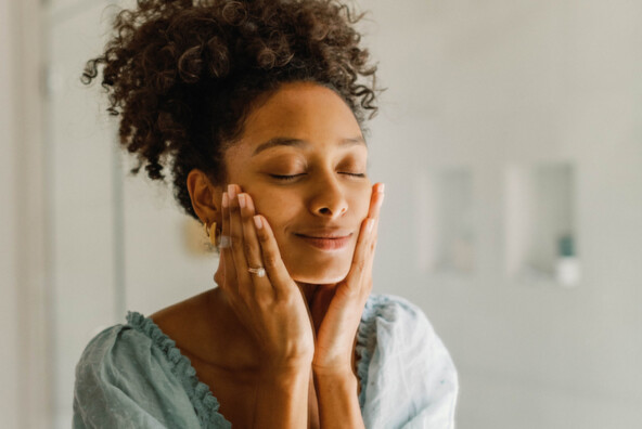 Woman washing face