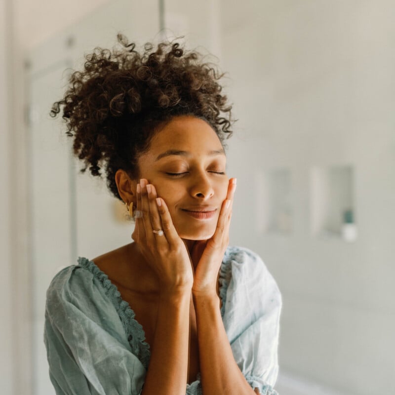 Woman washing face