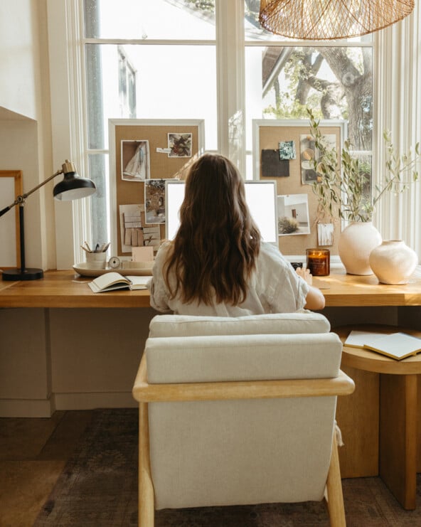 Woman writing at desk