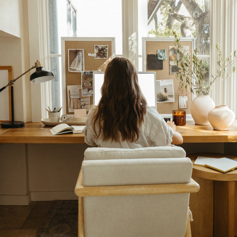 Woman writing at desk