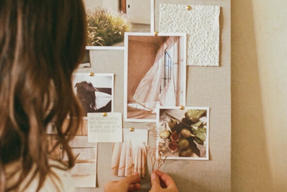 camille styles with vision board
