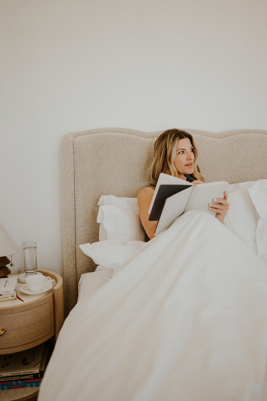 Inge Theron Journaling in Bed Nighttime Rutin.