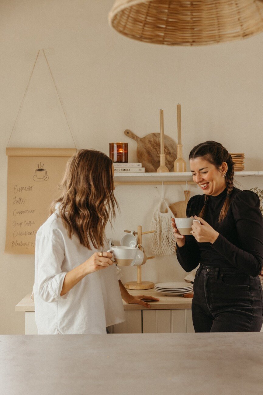 friends hanging out in kitchen, at-home cafe gathering