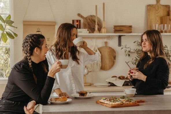 friends hanging out in kitchen, at-home cafe gathering