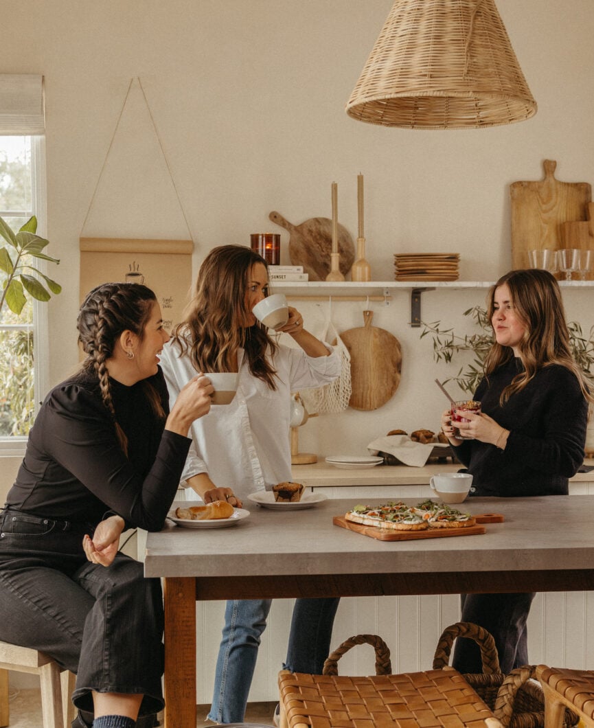 friends hanging out in kitchen, at-home cafe gathering