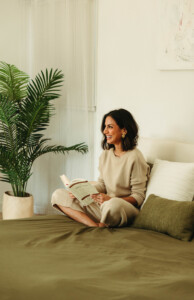 Woman reading in bed