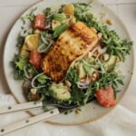 citrus salmon salad with avocado, yellow shirt