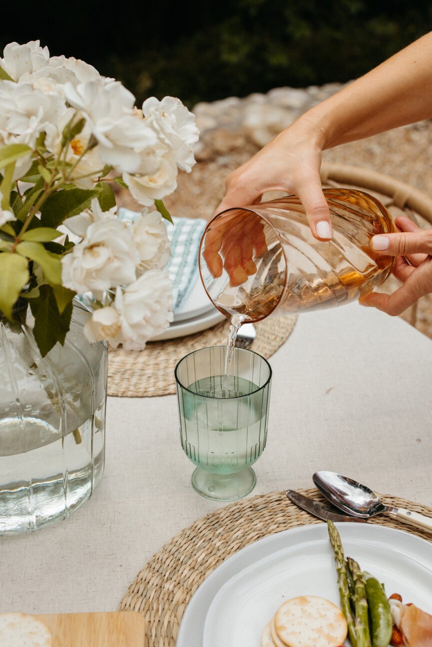 Pouring water from pitcher