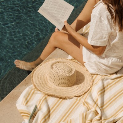 feel good summer essentials reading by pool