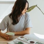 jules acree reading a book drinking matcha