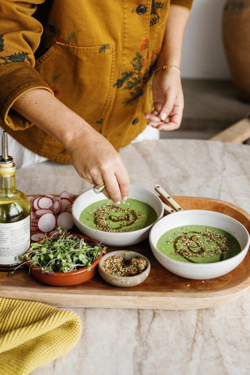 placing toppings on spring pea gazpacho