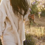 Woman carrying flowers