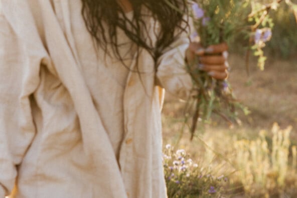 Woman carrying flowers