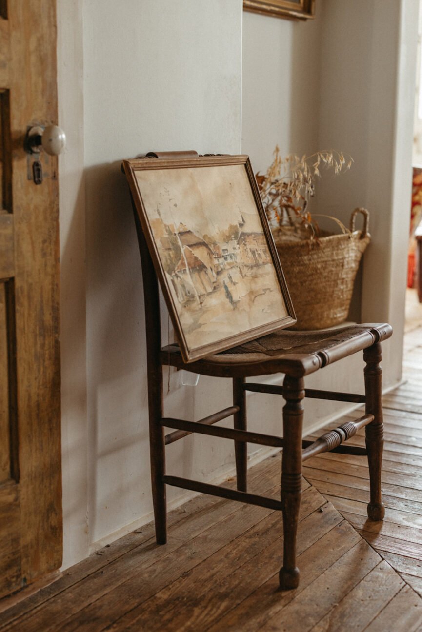 Vintage chair and painting.