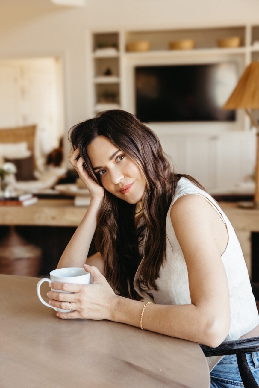 Woman drinking coffee.