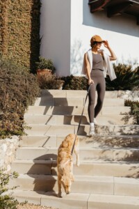 Camille Styles walking dog