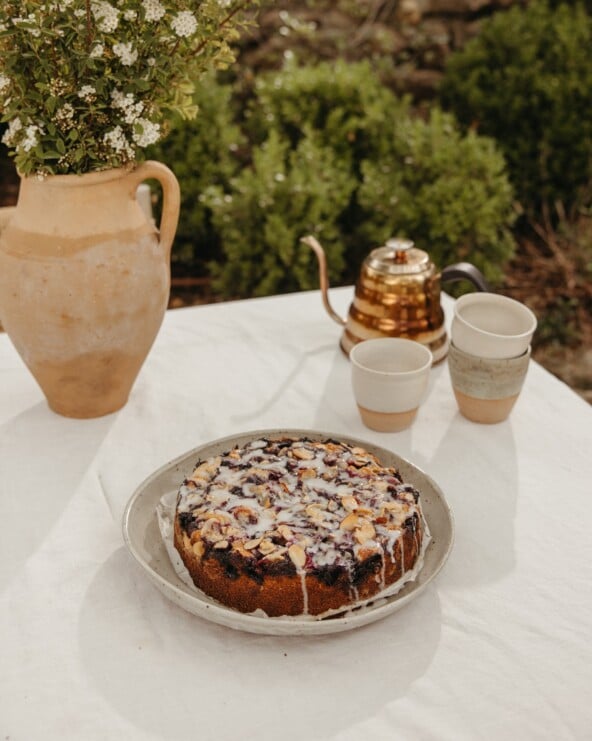 blueberry cornmeal cake with almond crumble and lemon glaze