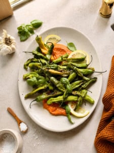 Charred Shishitos with Romesco, Lemon & Herbs