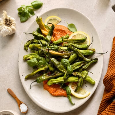 Charred Shishitos with Romesco, Lemon & Herbs